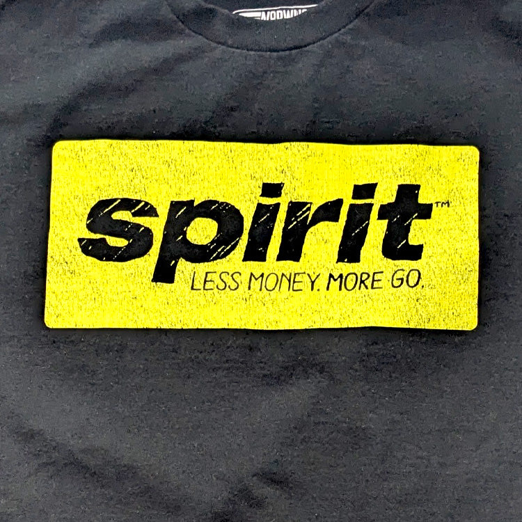 Spirit airlines vintage style black aviation retro t shirt with yellow logo closeup