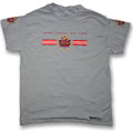 A gray short-sleeve t-shirt featuring a Trans-Canada Air Lines (TCA) graphic on the chest with red and white stripes and a maple leaf logo, plus sleeve patches and a small 'AV8R Wings' mark near the bottom hem.